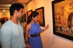 As Sangram Singh and Payal Rohati take a look at discuss the art works at curator Nitin Shete_s  Eclectic Blend exhibition.JPG
